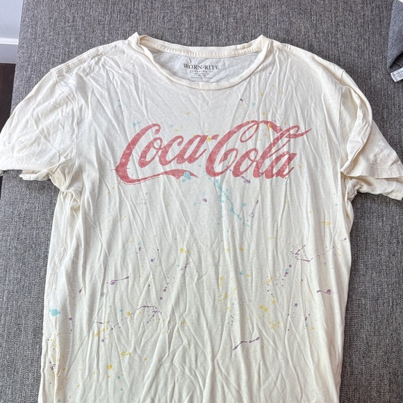 Coca Cola Tops - Coca-Cola Cream Shirt with Subtle Accents